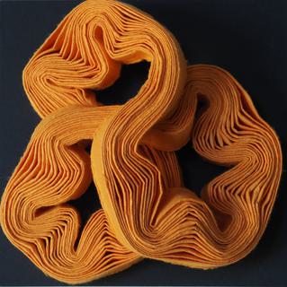 Knotted pleats. Folded paper.
